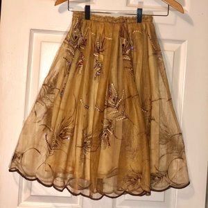 Lovely, never worn, sequined gold skirt by Nygard.